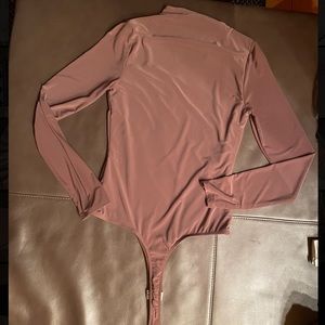 Like new pink bodysuit